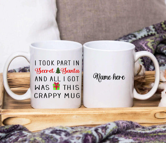 Personalisierte Tasse "Ich nahm am geheimen Weihnachtsmann teil. Alles, was ich bekam, war diese beschissene Tasse".